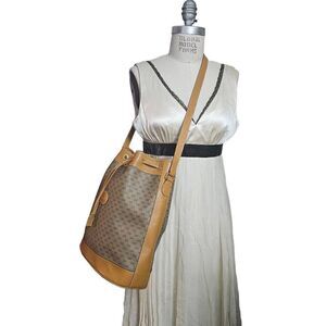 Gucci Vintage drawstring monogram bucket crossbody bag